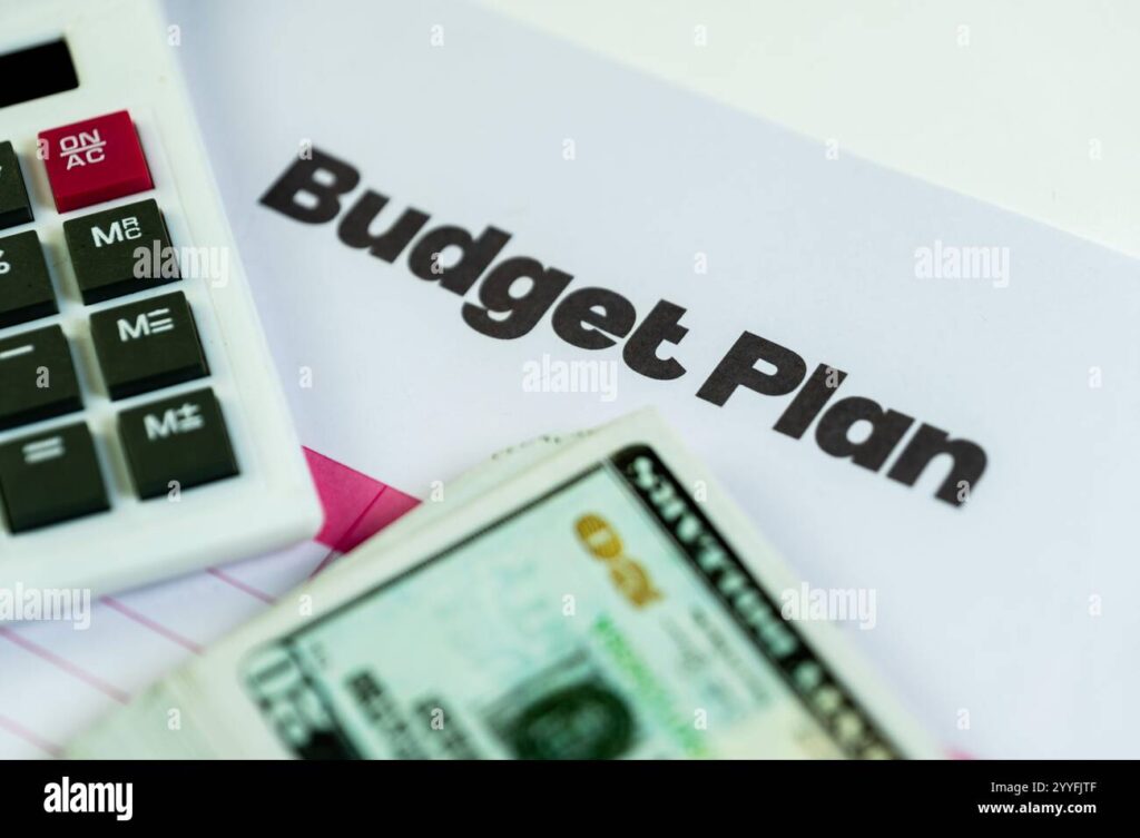 crafting-a-secure-financial-future-budget-plan-calculator-and-cash-symbolize-smart-money-management-2YYFJTF